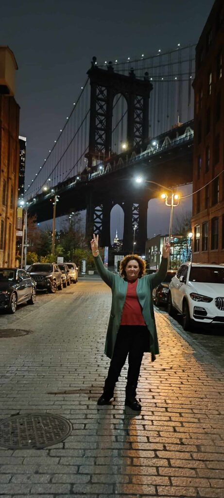 Foto nocturna en Dumbo Park frente al puente de Williamsburg